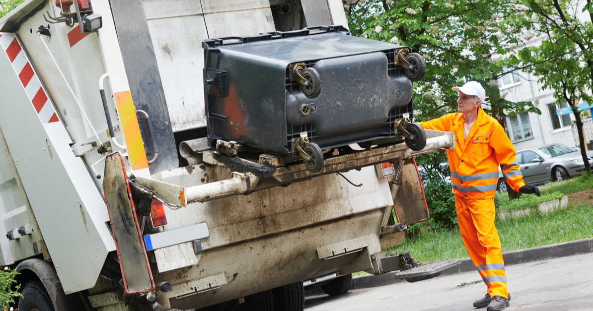 sanitation worker collecting garbages