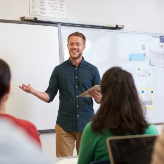 a teacher discussing with his class