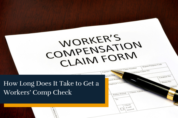 workers' compensation claim form and a pen on a table
