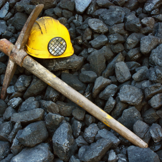 pickaxe and a mining helmet in a coal mine